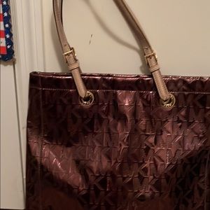 Michael Kors tote like new some wear on handles